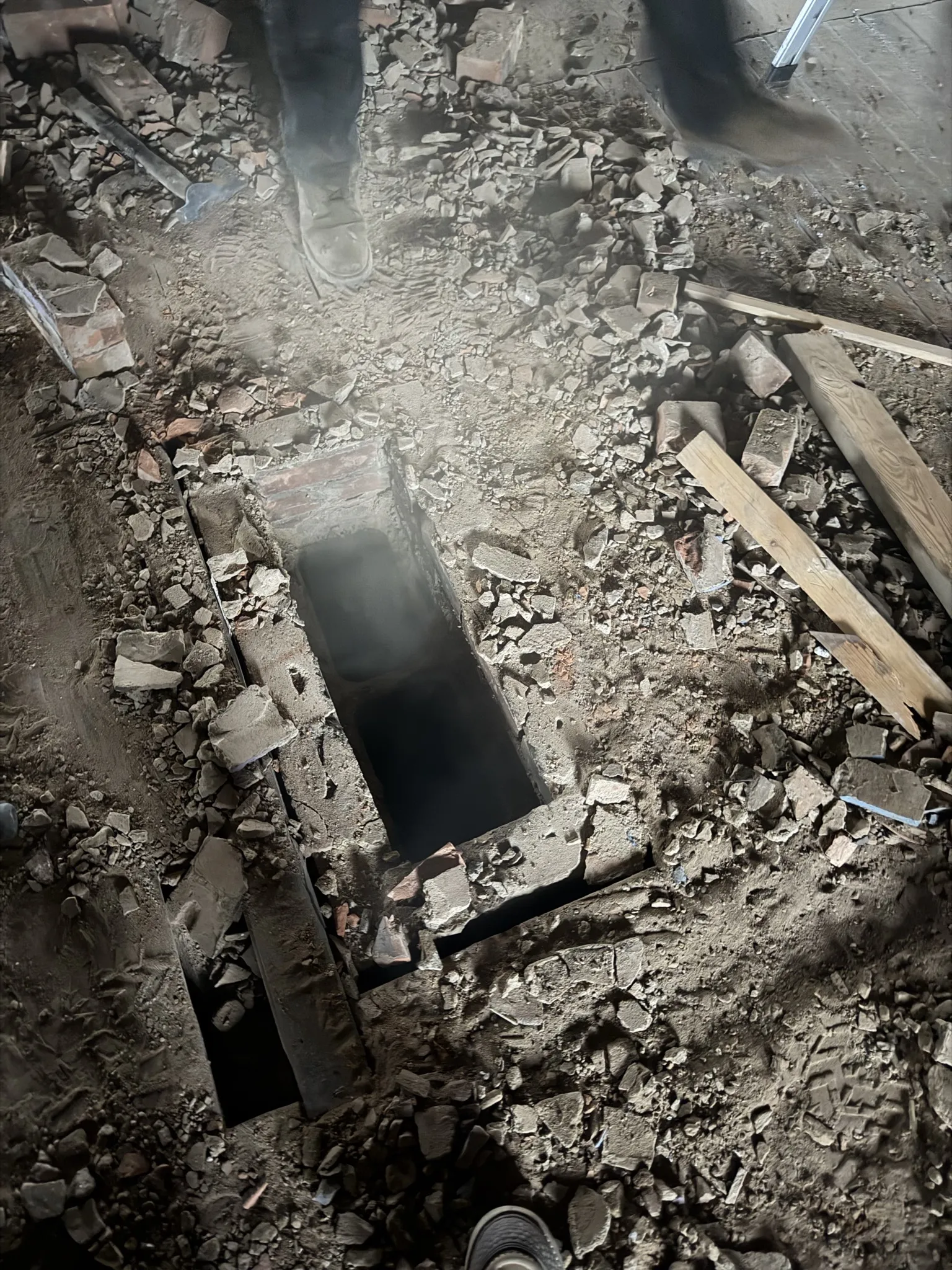 Floor opening exposed during interior demolition work
